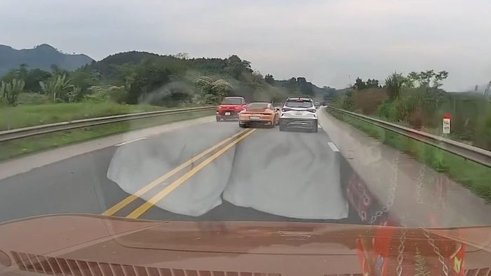 Canh sat xac minh doan xe sang chay nguoc chieu tren cao toc-Hinh-2