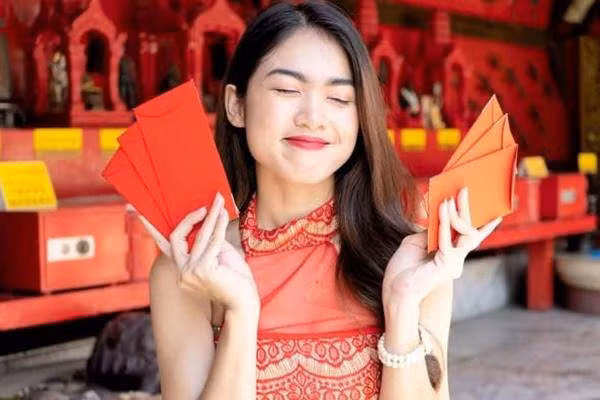 Cam ky khi su dung bao li xi ngay Tet, luu y khong duoc co 3 con so!