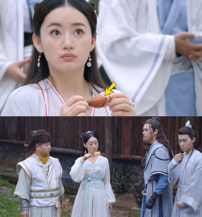 Trong một cảnh khác, Lưu Ly Tiên được bạn bè tặng đồ ăn vặt. Chỉ trong một tích tắc, chiếc đùi gà đã biến thành bắp ngô. Ảnh: Sina.