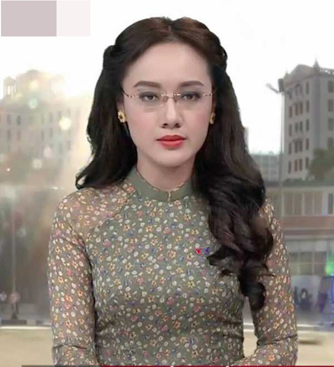 BTV Thoi su Hoai Anh bao nam gan voi chiec ao dai-Hinh-2