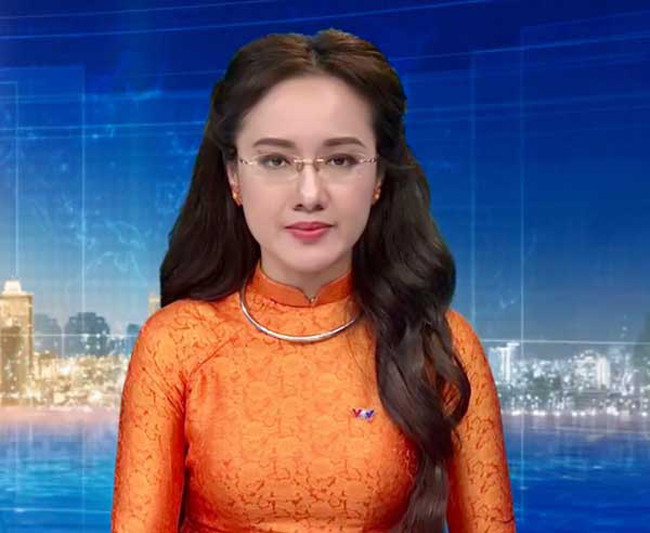 BTV Thoi su Hoai Anh bao nam gan voi chiec ao dai