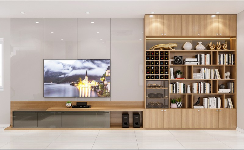 Kệ tivi kết hợp với giá sách và kệ rượu, nhằm tiết kiệm diện tích.