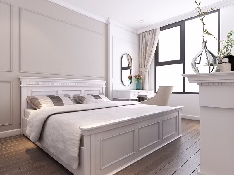 Nội thất và sơn tường màu trắng giúp phòng ngủ sở hữu không gian rộng rãi, để các thành viên trong nhà nghỉ ngơi.