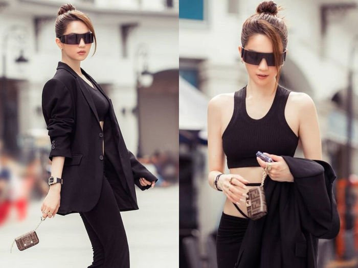 Ngọc Trinh diện set đồ đen kết hợp với mái tóc được búi gọn.