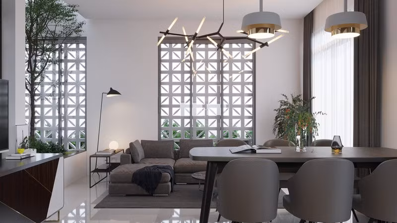 Điểm cộng thứ 2 của căn hộ nhỏ chính là tường làm bằng bông gió, cho phép ánh sáng và gió tự do di chuyển vào nhà.