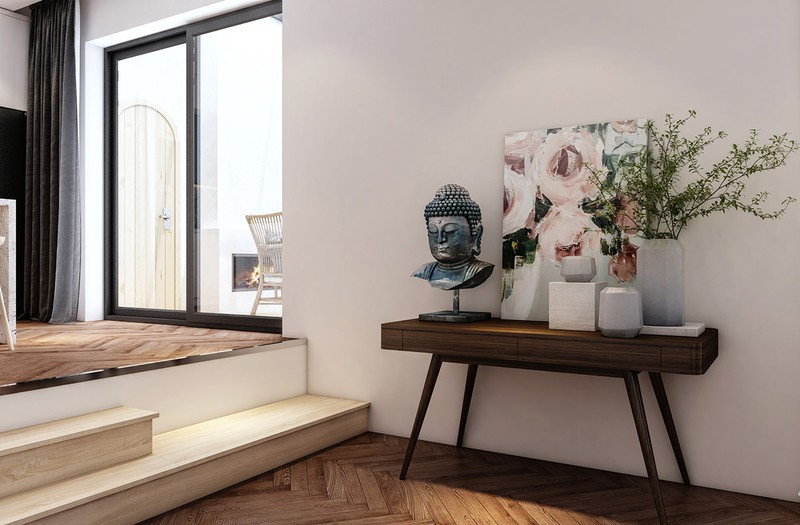 Bên cạnh đó, các yếu tố trang trí như tranh ảnh, bình hoa cũng được khéo léo đưa vào nhà.