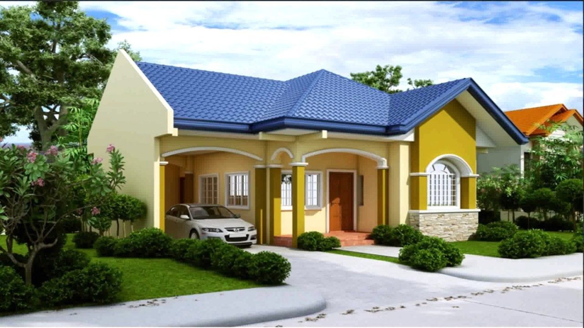 Ngôi nhà có hệ thống cột vững chắc, sử dụng tông vàng chủ đạo với đường nét trang trí đơn giản nhưng không kém phần tinh tế