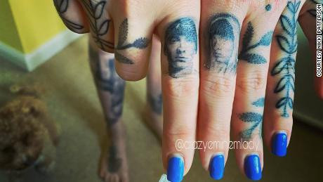 Nguoi phu nu xam hinh rapper Eminem khap co the-Hinh-5