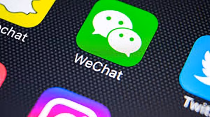 Nhom nguoi dung WeChat kien My ve lenh cam giao dich
