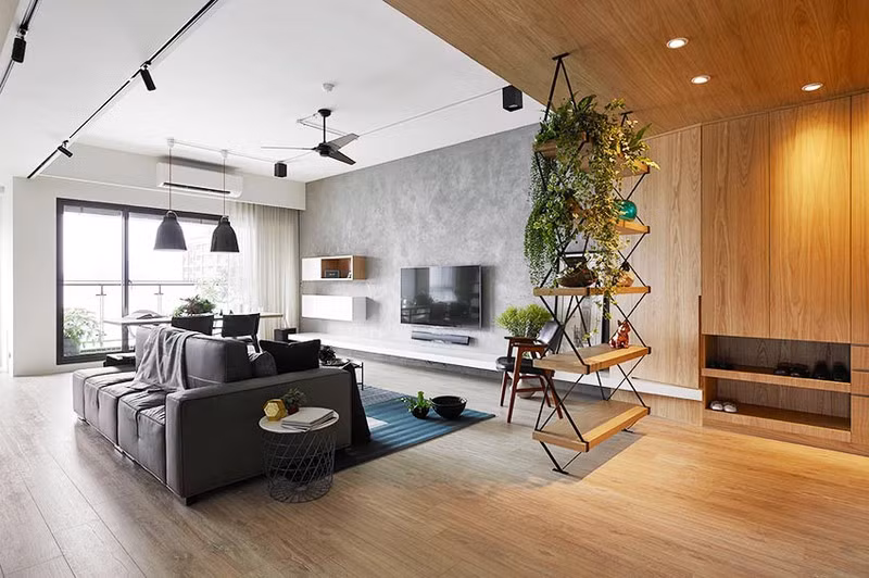 Một chiếc kệ mở đặt ở giữa phòng khách và phòng ăn là nơi trưng bày những quyển sách hoặc các loại cây trong nhà.