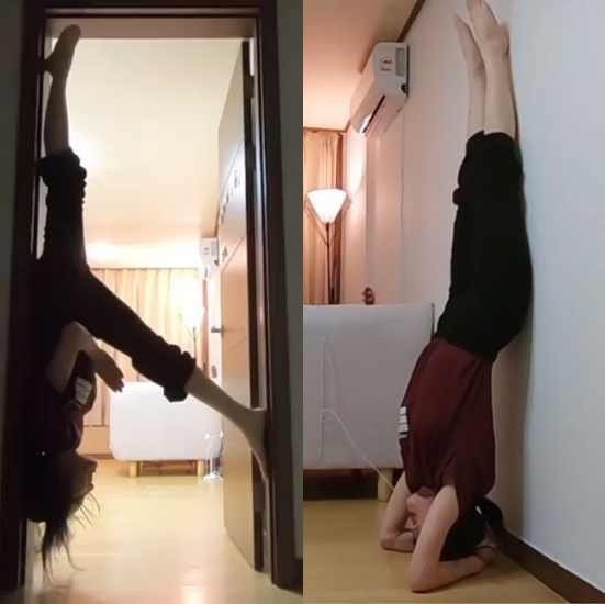 Vừa qua, fanpage chính thức của nhóm GFriend chia sẻ khoảnh khắc Yuju trồng cây chuối và giãn cơ ở tường, cửa nhà với dòng chú thích cổ vũ người hâm mộ: "Hãy ở nhà một cách khỏe mạnh giống Yuju". Dưới bài viết, nhiều dân mạng để lại bình luận. Có người bày tỏ: "Động tác này khó lắm nhưng nhìn cô ấy thực hiện thật dễ dàng". Ảnh: @gfriendofficial.