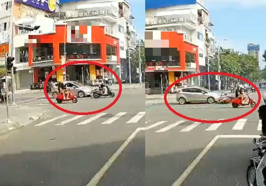 Thanh nien vut xe may cuu co gai bi tai nan giua nga tu