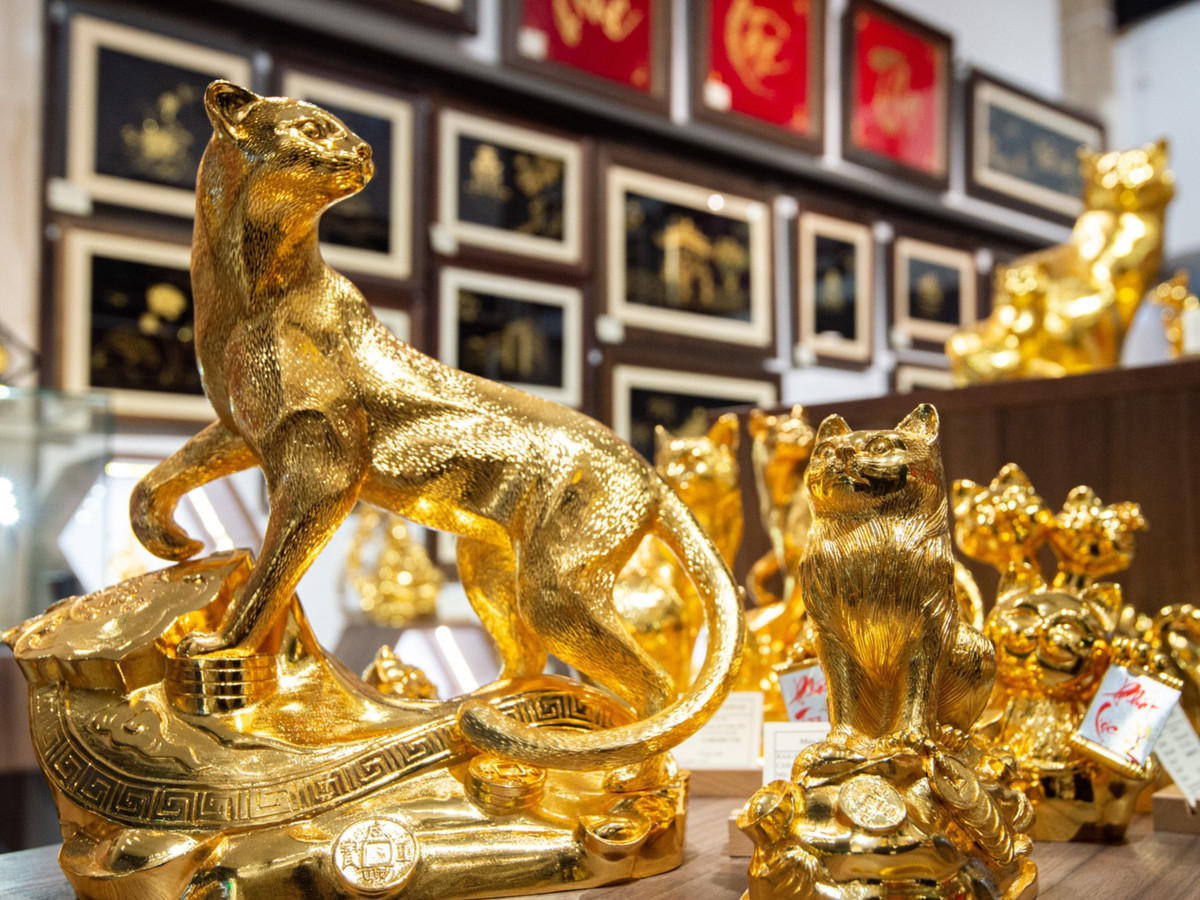 Gia vang hom nay 21/1: USD giam, vang huong loi