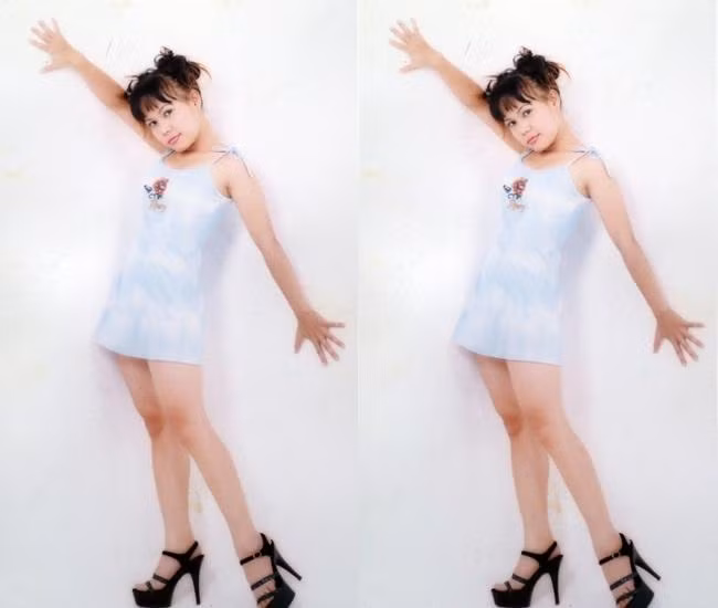 Bức ảnh thứ 2 Việt Hương chia sẻ lại có sự tương phản, lúc này cô 19 tuổi. Danh hài hé lộ khoảnh khắc này được chụp tại trường Sân khấu, "góc nào láng láng là vô chụp xoè cánh". Tác giả của bức ảnh này chính là đạo diễn Vũ Ngọc Đãng. Trong ảnh, Việt Hương dù "quất" đôi guốc rất cao nhưng vẫn lộ rõ vẻ nhỏ con.