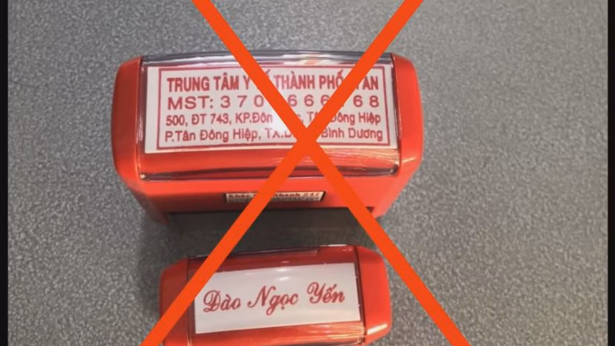 Cong an Binh Duong bat giu 3 doi tuong lam gia giay test COVID-19-Hinh-2