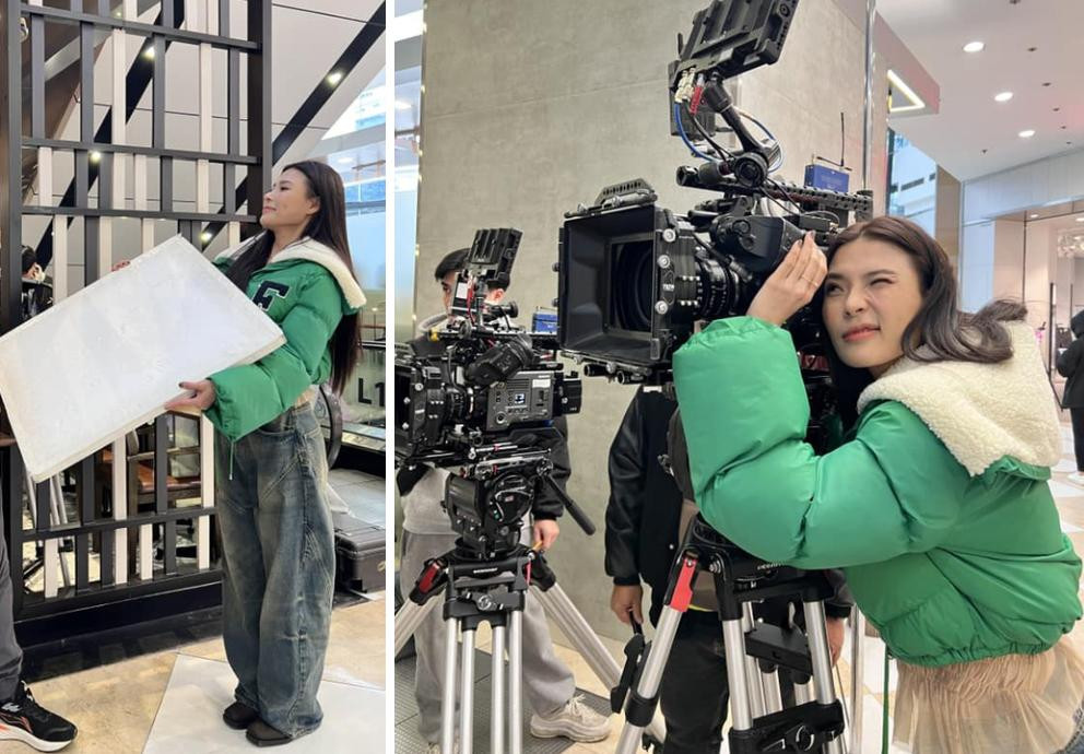 Nữ diễn viên khoe ảnh hậu trường phim với áo phao xanh lá bắt mắt.