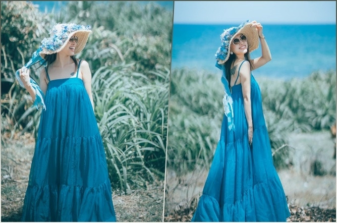 Nữ MC “Hugo và các bạn” tươi tắn tạo dáng bên bờ biển với váy maxi hai dây màu xanh xếp tầng. Điểm nhấn của trang phục là chiếc mũ cói có hoa voan đắp nổi quanh vành, được Vân Hugo mix cùng kính mát và hoa tai hình tròn.