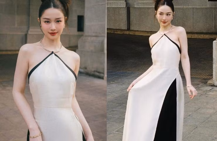 Chiếc đầm cổ yếm làm nổi bật phần xương quai xanh, thân hình mảnh dẻ của nữ diễn viên.