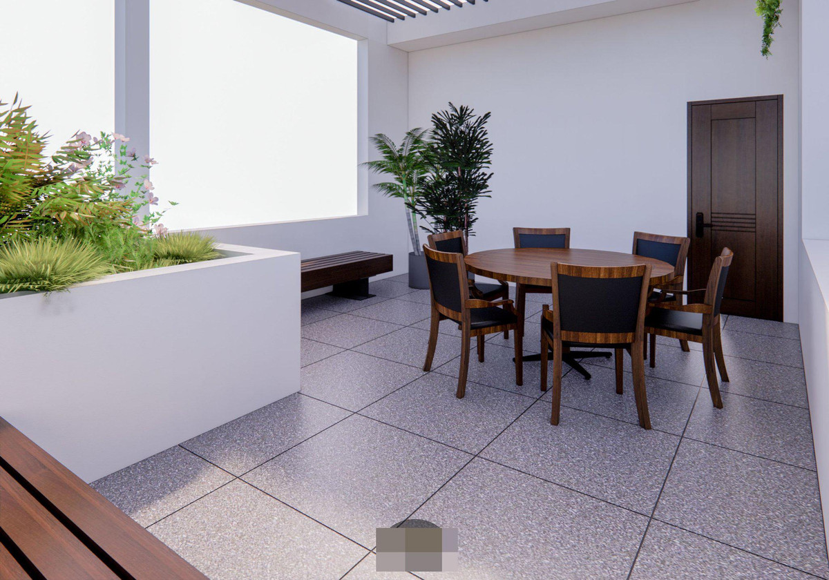 Vườn treo sân thượng với thảm thực vât xanh mát như "tấm đệm" cản nắng, giảm nhiệt cho dưới nhà thông qua lớp lam gỗ kết hợp giàn cây leo trong tương lai.