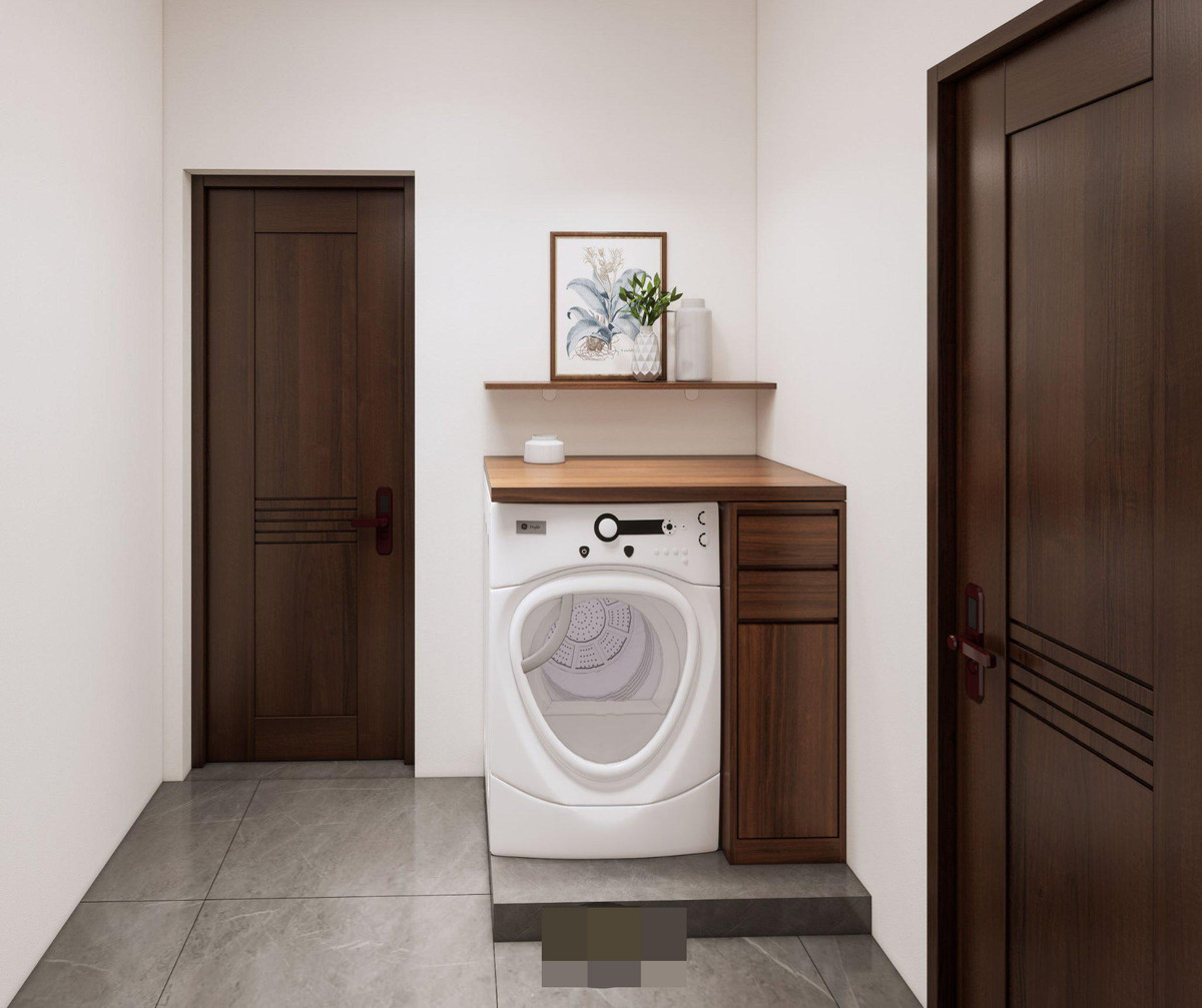 Khu giặt đồ nhỏ gọn cạnh phòng tắm.