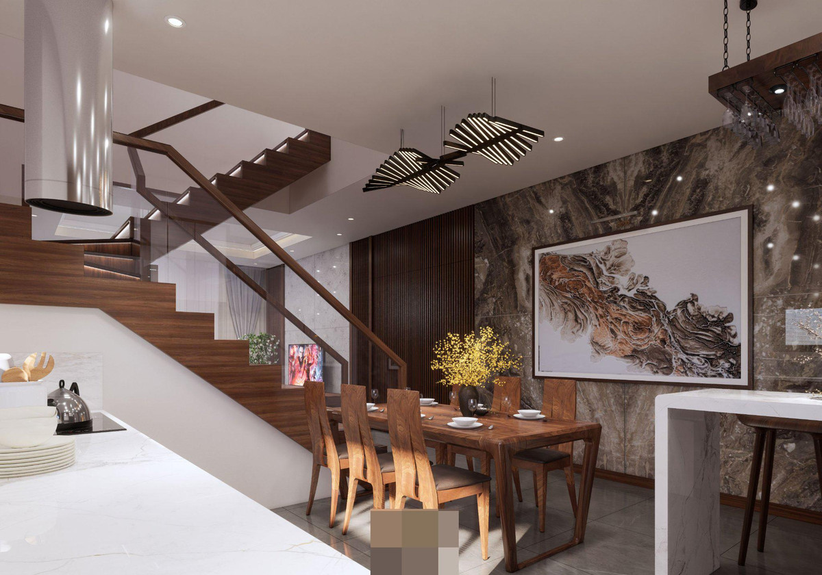 Bếp nấu hình chữ I đặt sát tường đầy đủ nội thất. Mặt bếp được ốp đá màu trắng sang trọng, nổi bật giúp việc lau chùi dễ dàng và nhanh chóng.