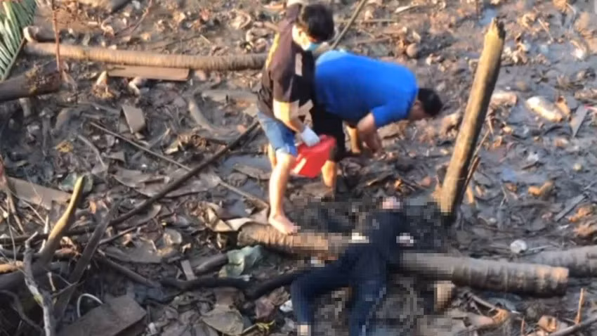 Phat hien thi the co gai troi tren song Tien