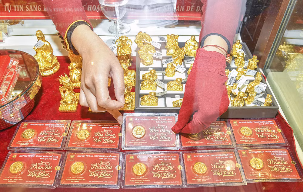 Gia vang thuong giam sau ngay via Than Tai, sao phai do xo di mua gia dat?