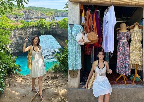 rong chuyến du lịch Indonesia, người đẹp Hà thành chọn chiếc Raffia tote bag của Prada. Thiết kế có giá 1.990 USD (khoảng 46 triệu đồng). Instyle gọi đây là chiếc túi tote chuyên dùng để đi biển.