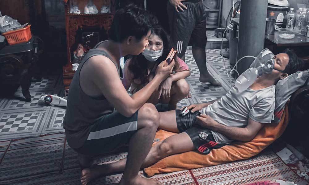 Dai gia dinh 15 F0 trong hem nho o TP.HCM chien thang COVID-19-Hinh-4