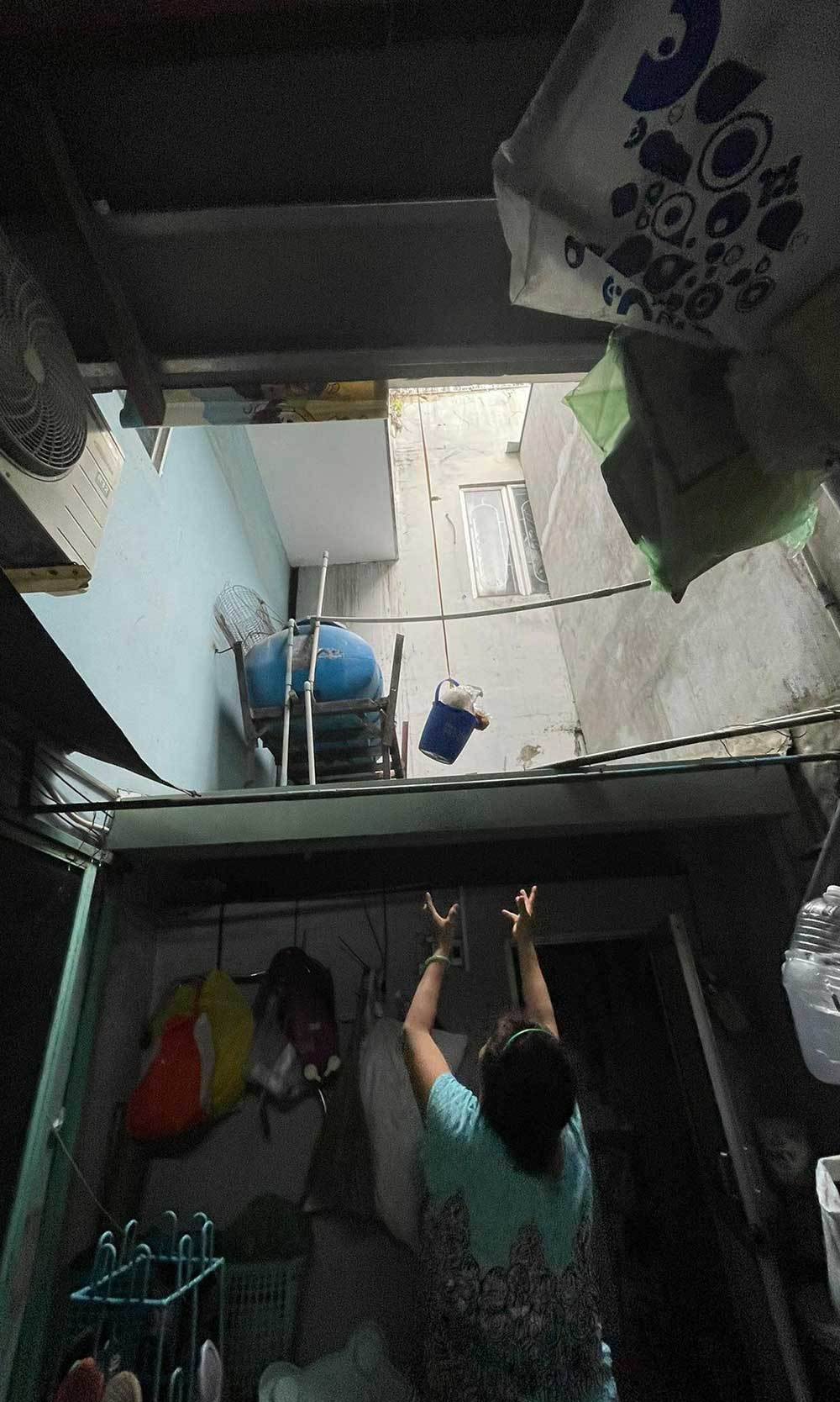 Dai gia dinh 15 F0 trong hem nho o TP.HCM chien thang COVID-19-Hinh-3