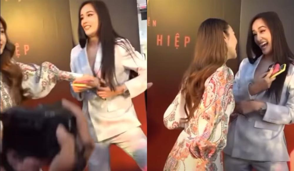 rong 1 sự kiện cách đây không lâu, Mai Phương Thúy diện vest hờ hững khoe 1 căng tràn. Khi di chuyển, chiếc áo phản chủ khiến Mai Phương Thúy xém "lộ hàng". Rất nhanh chóng, Minh Hằng đã lao tới, dùng tay che chắn giúp nàng hậu thoát khỏi tình huống nguy hiểm. Hành động của Minh Hằng nhận được lời khen ngợi từ cộng đồng mạng.