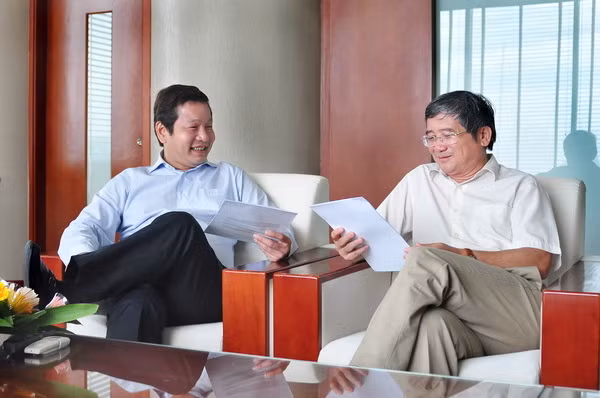 Ông Trương Gia Bình (trái) và ông Bùi Quang Ngọc (phải)