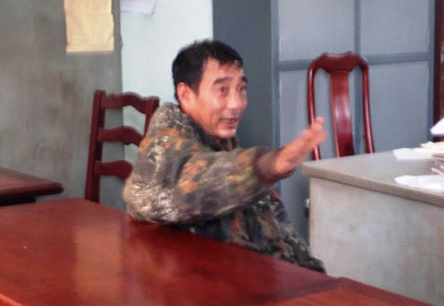 Đối tượng Nguyễn Đức Long tại trụ sở công an quận 9.