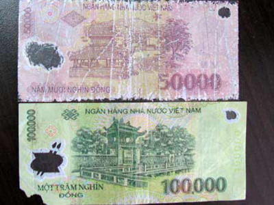 Tiền rách nát, không đủ tiêu chuẩn lưu thông sẽ được đổi không mất phí. Ảnh: Internet.