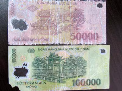 Tiền rách nát, không đủ tiêu chuẩn lưu thông sẽ được đổi không mất phí. Ảnh: Internet.