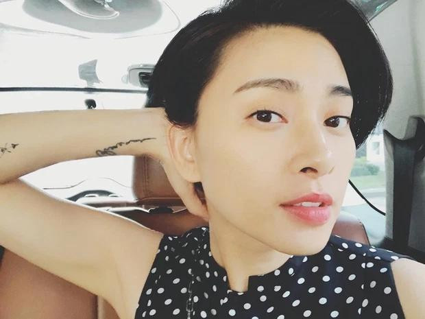 Ngo Thanh Van hiem hoi khoe hinh xam ca doi, lien quan Huy Tran?-Hinh-11