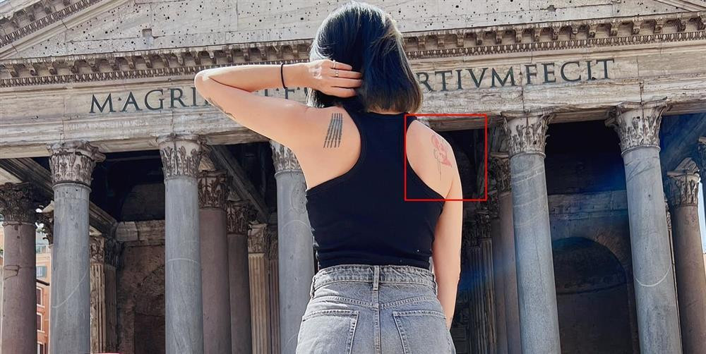 Ngo Thanh Van hiem hoi khoe hinh xam ca doi, lien quan Huy Tran?