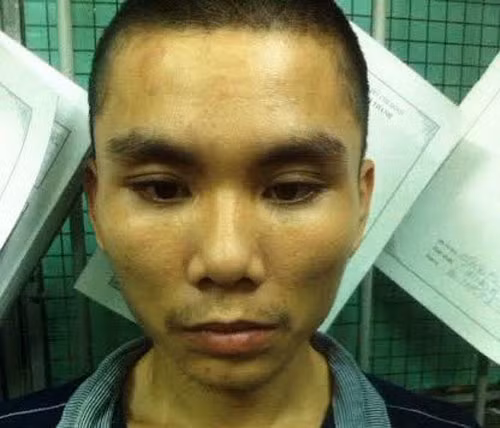 Nghi can Nguyễn Anh Tín vừa bị bắt giữ sau vài giờ gây án.