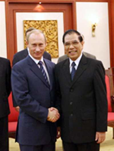 Tổng Bí thư Nông Đức Mạnh lúc đương chức, đón tiếp Tổng thống V.Putin trong chuyến thăm chính thức năm 2006. Ảnh: TTXVN
