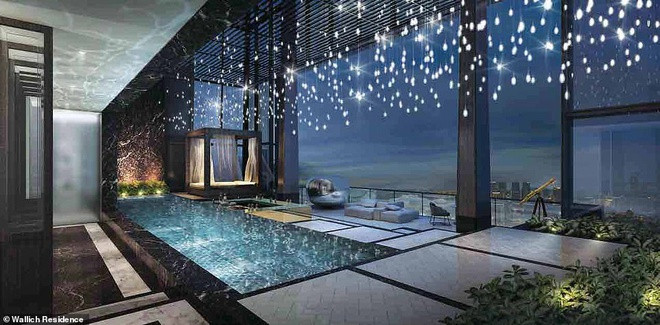 Nằm trên vị trí cao nhất Singapore, căn penthouse có tầm nhìn ra toàn thành phố với thiết kế cửa kính trong suốt trải dài. Ngôi nhà còn có bể bơi trong nhà. Ảnh:Wallich Residence.