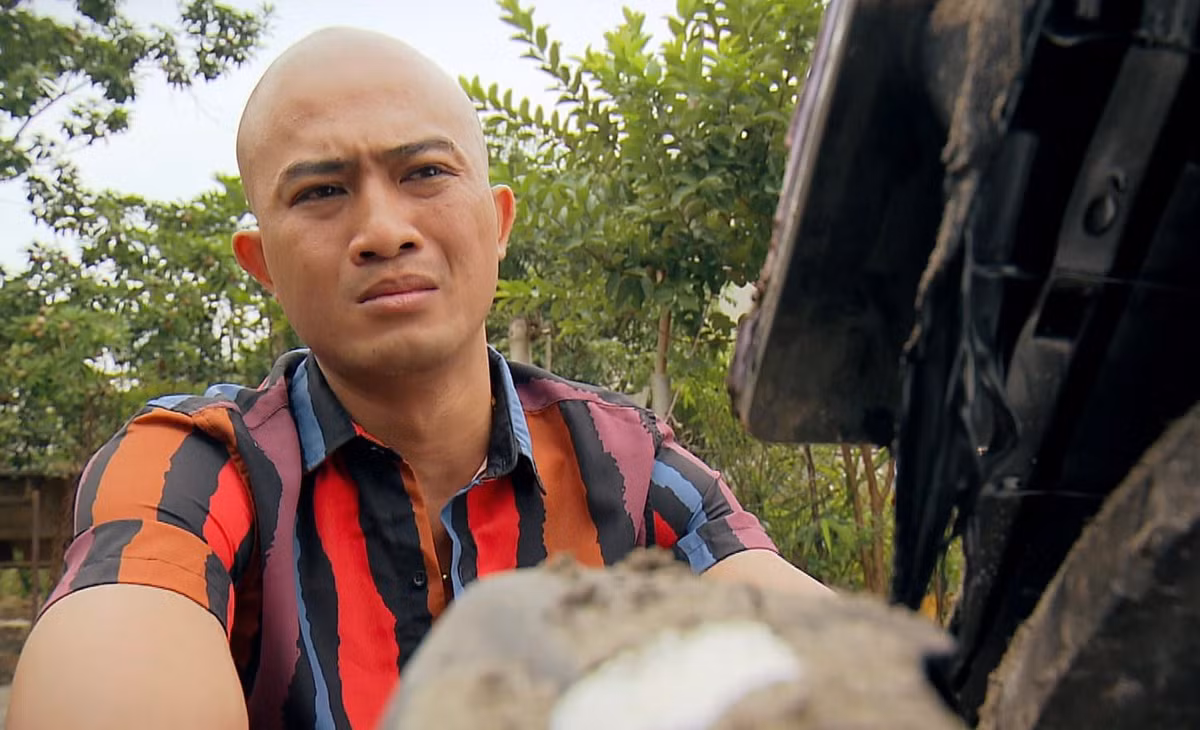 Hai hinh anh doi lap cua Doan Quoc Dam-Hinh-5