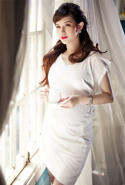 Quỳnh Chi hài lòng với cuộc sống hiện tại.