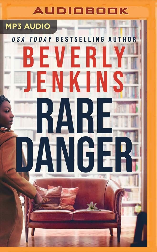 Cuốn Rare Danger của Beverly Jenkins, giọng đọc Kim Staunton. Trong câu chuyện này, nữ nhân vật Jasmine Ware thích quản lý sách cho nhóm khách hàng của mình. Nhưng khi một bản thảo quý hiếm bị mất tích, Jasmine và cựu binh Lực lượng Không quân Mỹ Torr Noble phải hợp tác với nhau để tìm ra tác phẩm bị trộm. Quá trình tìm kiếm đã kéo họ lại gần nhau hơn, nhưng liệu mối quan hệ hợp tác của họ có tiến sâu hơn được không? Ảnh: Amazon.