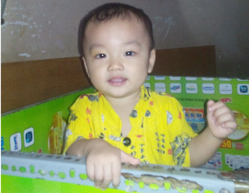 Ảnh bé Đinh Gia Huy trước khi bị bỏ rơi trên taxi mà gia đình ông Liêm lưu giữ.