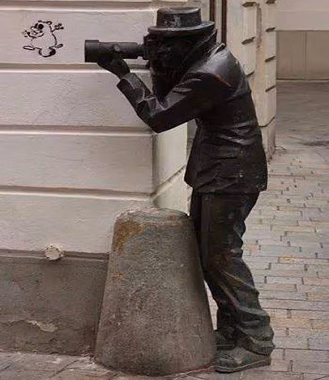 Một anh chàng nhiếp ảnh gia.