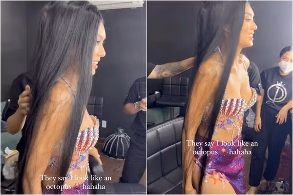 Sở hữu nhan sắc xinh đẹp và tính cách cởi mở trên MXH, Thảo Nhi Lê hậu lên ngôi Á 1 Miss Universe Việt Nam 2022 ngày càng được dân tình yêu mến và quan tâm. Mới đây, cô nàng còn chia sẻ khoảnh khắc hậu trường trong buổi chụp hình mới. Diện bộ đồ "tiên cá" màu tím và đội thêm tóc giả, Thảo Nhi gây chú ý không chỉ vì đụng hàng toàn sao khủng mà còn vì bộ dạng có phần "sai sai".