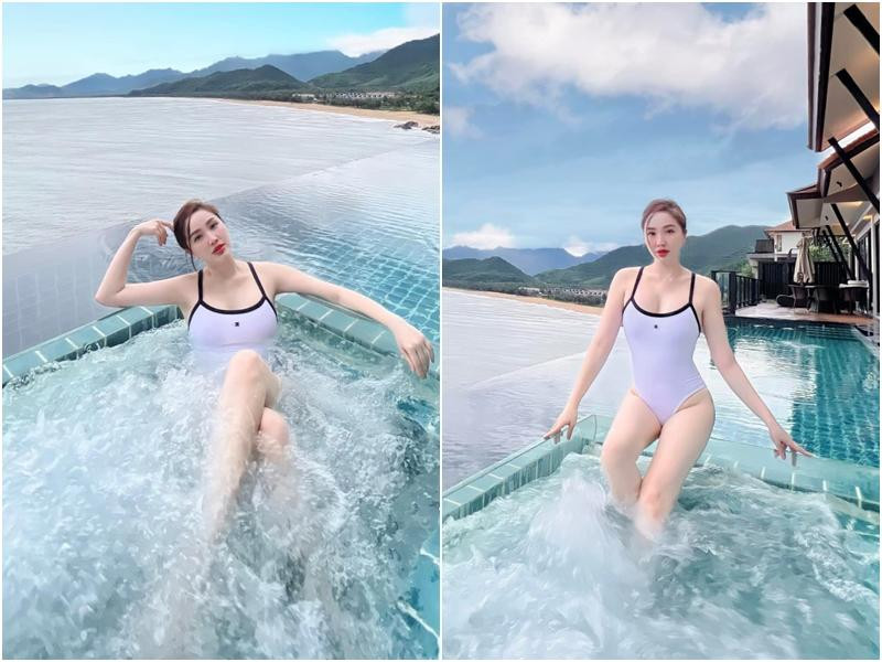 Màn đụng độ thứ 2 là với Bảo Thy. Bộ đồ tắm một mảnh Chanel được "mẹ bỉm" chọn trong chuyến đi Huế để khoe body như chưa hề sinh nở và làn da trắng như phát sáng.