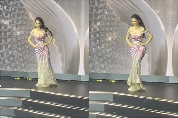 Catwalk chưa vững nhưng Lê Bống vẫn tự tin "tạo nét" bằng một cú xoay trên sân khấu. Tuy nhiên, người đẹp lại hơi "ô dề" khi mất đà và tí ngã ngửa ra sau. Sau đó, Lê Bống tiếp tục cho thấy sự lúng túng khi xử lí váy dạ hội dài quét đất. Mặc đầm ôm sát nhưng hot TikToker loạng choạng hất tà váy đang vướng vào chân một cách lộ liễu nhìn vô cùng thiếu chuyên nghiệp. Xem video, nhiều người tỏ ra bất ngờ vì phân cảnh này khi lên tivi gần như không được quay đến. Có lẽ Lê Bống nên bồi dưỡng thêm kĩ năng catwalk nếu muốn tiếp tục thử sức mình ở một cuộc thi Hoa hậu khác.