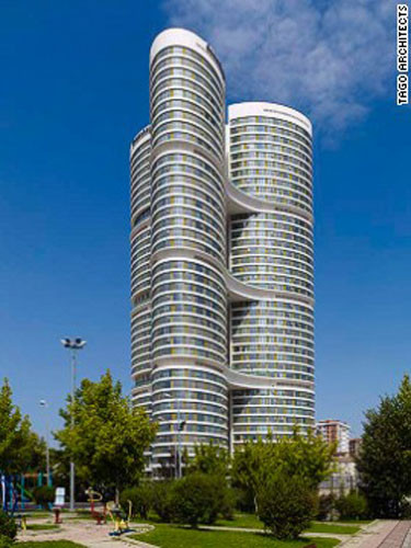 9. Tòa nhà Dumankaya IKON (Thổ Nhĩ Kỳ) Tòa nhà chọc trời bao gồm ba tháp hình elip ôm lấy nhau và nối liền nhau ở các tầng 12, 22 và 32. Tòa nhà Dumankaya IKON bao gồm 1.022 căn hộ và các văn phòng. Tầng trệt là một trung tâm mua sắm.