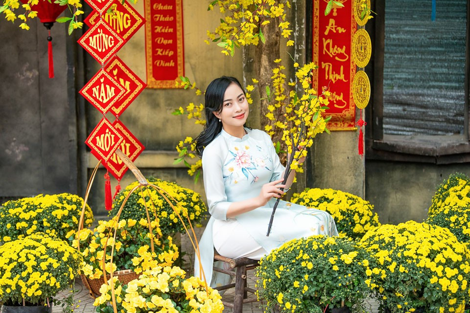 Chụp ảnh Tết là dịp để bạn trẻ lưu giữ lại kỷ niệm thanh xuân, khoảnh khắc đẹp của tuổi trẻ.